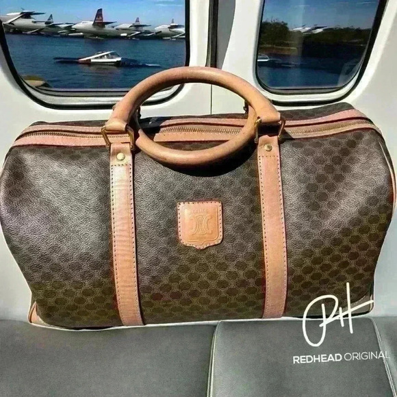 Celine Handbags - Celine Duffle- classic carryon W/added guitar strap strap-some wear but lovely